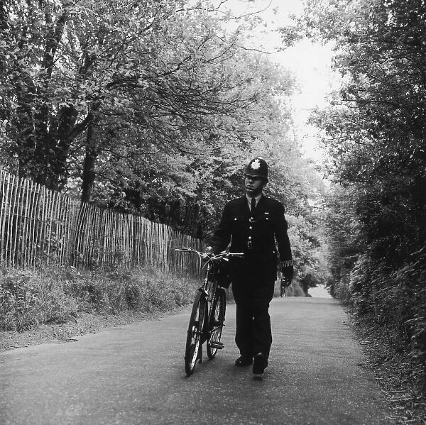 Met Police officer on a country lane