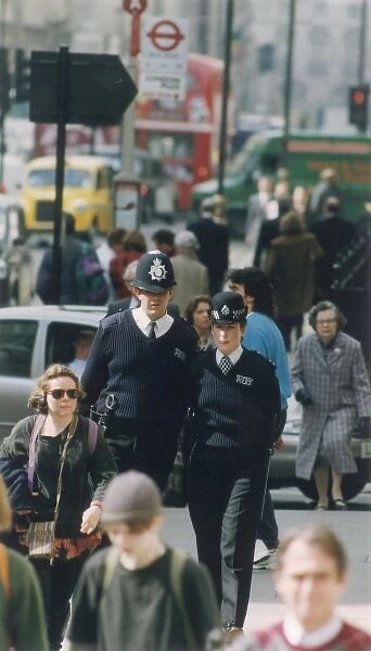 Met Police PC and WPC, urban scene
