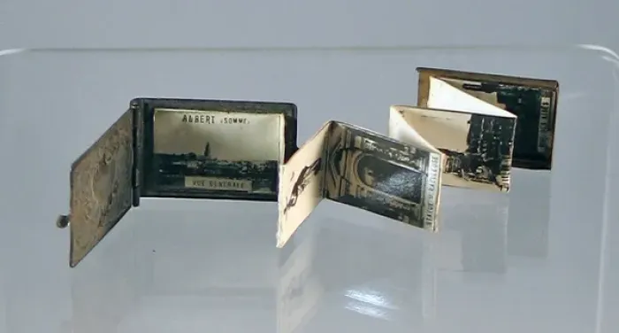 Framed Print : Metal cased album containing miniature WWI photographs Framed Print : Metal cased album containing miniature WWI photographs