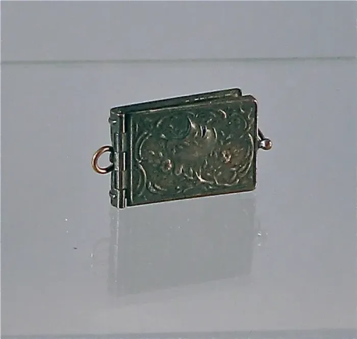Framed Print : Metal cased album containing miniature WWI photographs Framed Print : Metal cased album containing miniature WWI photographs