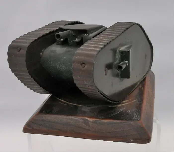 Framed Print : Metal model of WW1 tank on wooden base Framed Print : Metal model of WW1 tank on wooden base