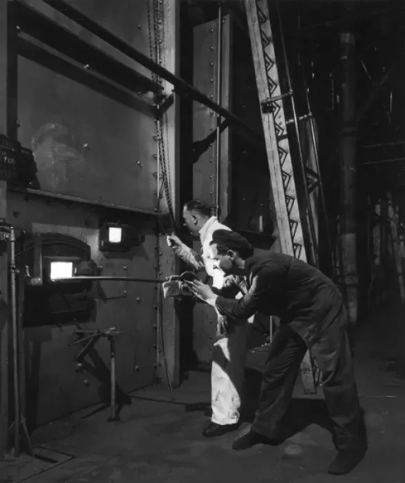 Framed Print : Metal being tempered in a furnace prior to shaping Framed Print : Metal being tempered in a furnace prior to shaping