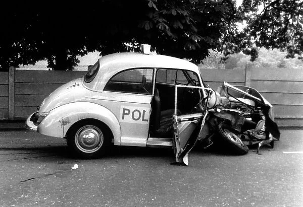 Metropolitan Police car with smashed bonnet