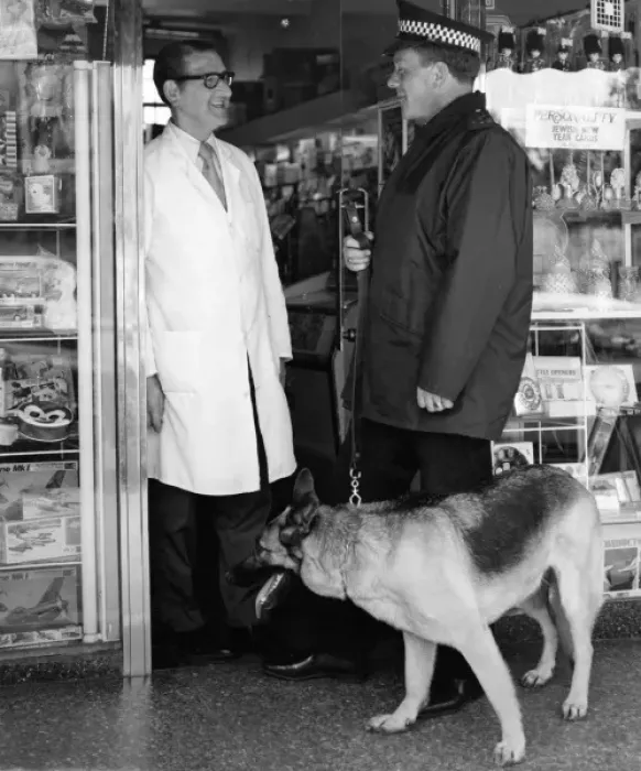 Framed Print : Metropolitan police officer and dog with shopkeeper Framed Print : Metropolitan police officer and dog with shopkeeper