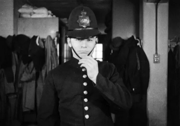 Framed Print : Metropolitan Police officer fitted with his uniform Framed Print : Metropolitan Police officer fitted with his uniform