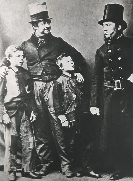 Metropolitan Police officer with man and two boys