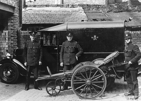 Metropolitan Police officers with hand ambulance