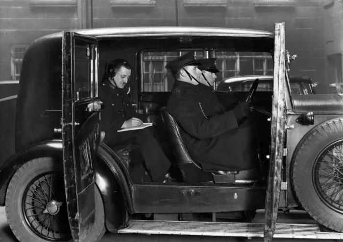 Framed Print : Metropolitan Police officers inside a car Framed Print : Metropolitan Police officers inside a car