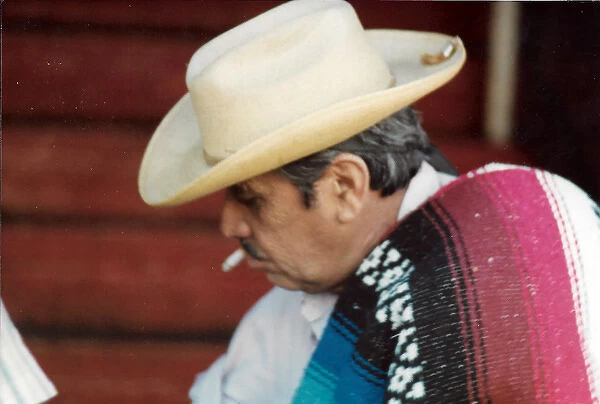 Mexican man with cigarette and hat