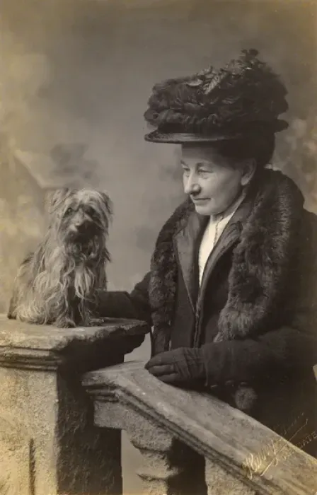 Framed Print : Middle aged woman with dog in studio photo Framed Print : Middle aged woman with dog in studio photo