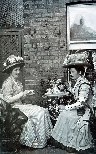 Two Middle Class Edwardian ladies take tea