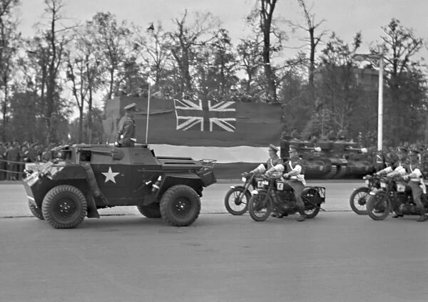 Military parade with jeep and motorbikes