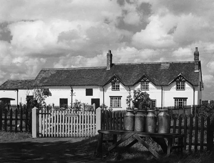 Framed Print : Milk churns outside a pictureque farmhouse called Dunkirk Farm Framed Print : Milk churns outside a pictureque farmhouse called Dunkirk Farm