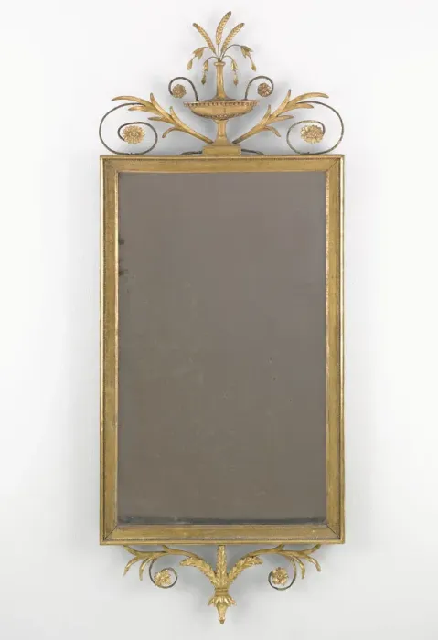 Framed Print : Mirror. Gilt carved wood and gesso pier glass surmounted by a vase Framed Print : Mirror. Gilt carved wood and gesso pier glass surmounted by a vase