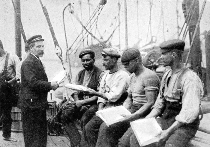 Framed Print : Mission to Seamen Chaplain distributing Papers, 1906