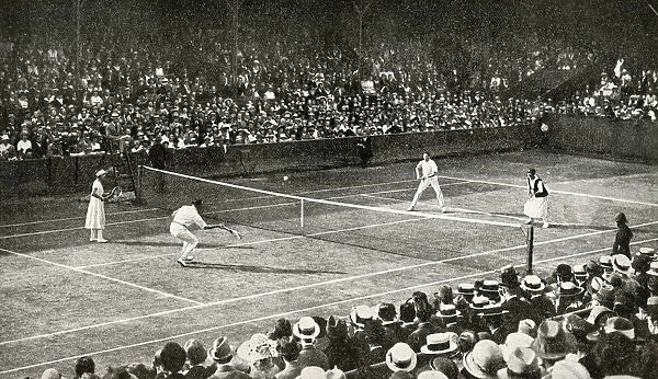 Mixed doubles match in progress, Wimbledon, SW London