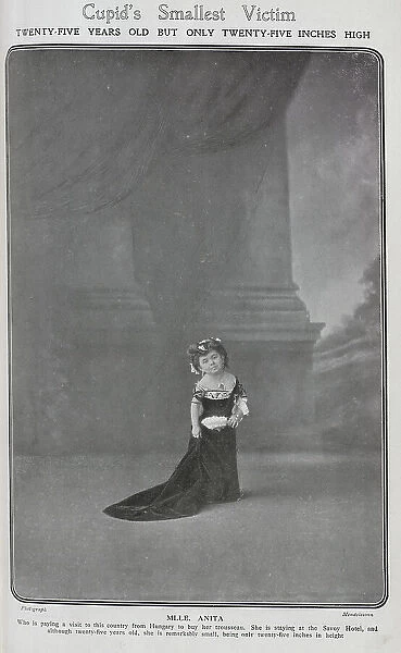Mlle Anita, actress with dwarfism, theatrical portrait on stage in velvet gown. Captioned, Cupid's Smallest Victim: twenty-five years old but only twenty-five inches high