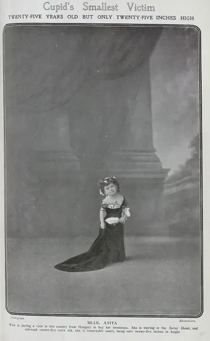 Framed Print : Mlle Anita, actress with dwarfism, theatrical portrait on stage in velvet gown. Captioned, Cupid's Smallest Victim: twenty-five years old but only twenty-five inches high Framed Print : Mlle Anita, actress with dwarfism, theatrical portrait on stage in velvet gown. Captioned, Cupid's Smallest Victim: twenty-five years old but only twenty-five inches high