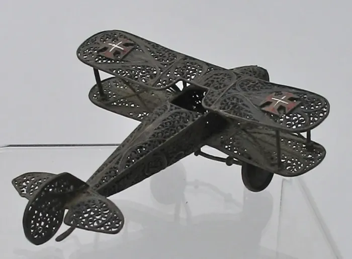 Framed Print : Model of biplane, finely cut wings and fuselage, WW1 Framed Print : Model of biplane, finely cut wings and fuselage, WW1