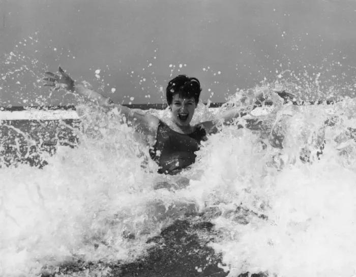 Framed Print : Model splashing about in the surf Framed Print : Model splashing about in the surf