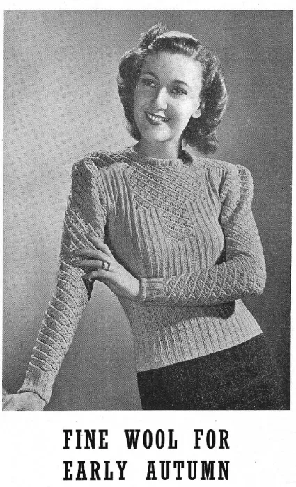 Framed Print : Model wearing a knitted sweater in a ribbed and lace pattern. Date: 1940 Framed Print : Model wearing a knitted sweater in a ribbed and lace pattern. Date: 1940