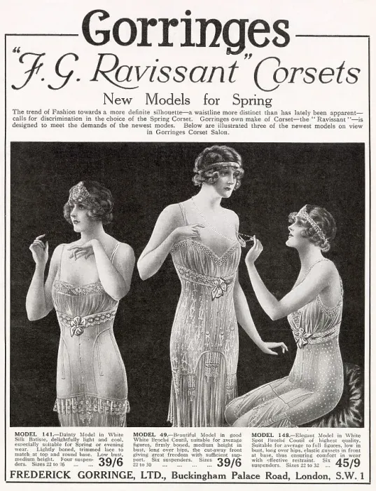 Framed Print : Three models wearing spring dainty lace corsets. Date: 1922 Framed Print : Three models wearing spring dainty lace corsets. Date: 1922