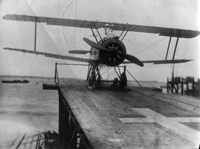 Framed Print : A much modified Sopwith F1 Camel on a lighter Framed Print : A much modified Sopwith F1 Camel on a lighter