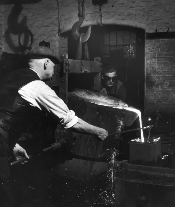 Framed Print : Molten metal is poured in to a mould Framed Print : Molten metal is poured in to a mould