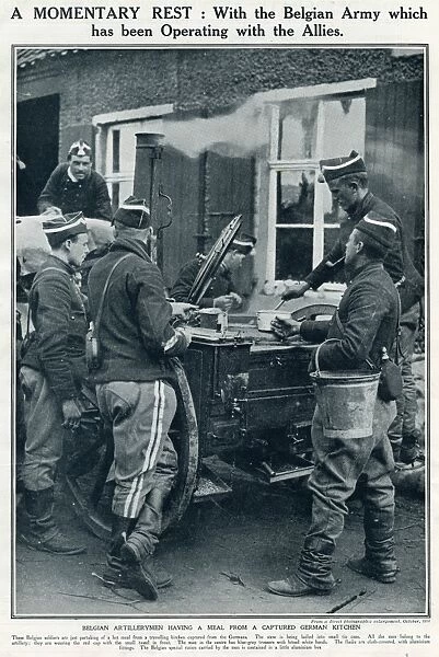 A momentary rest with Belgian artillerymen 1914