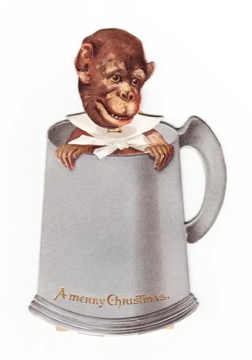 Framed Print : Monkey in a tankard on a movable Christmas card Framed Print : Monkey in a tankard on a movable Christmas card
