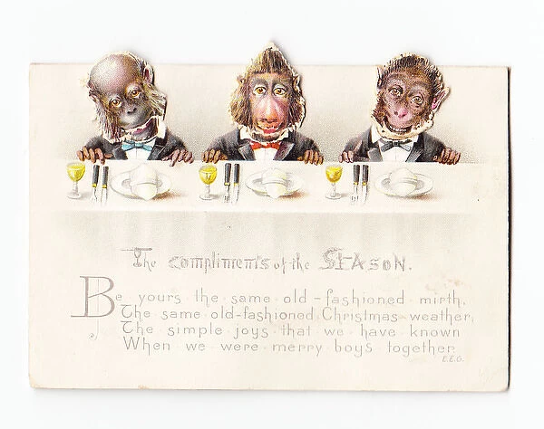 Three monkeys with moveable heads on a Christmas card