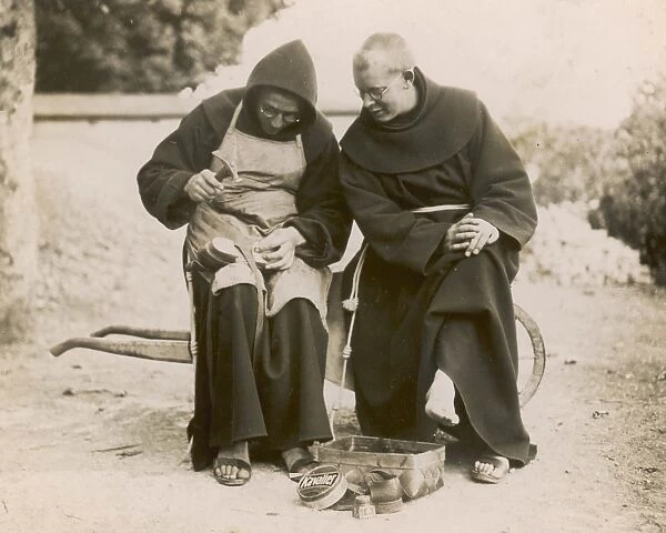 Monks Mending Sandals
