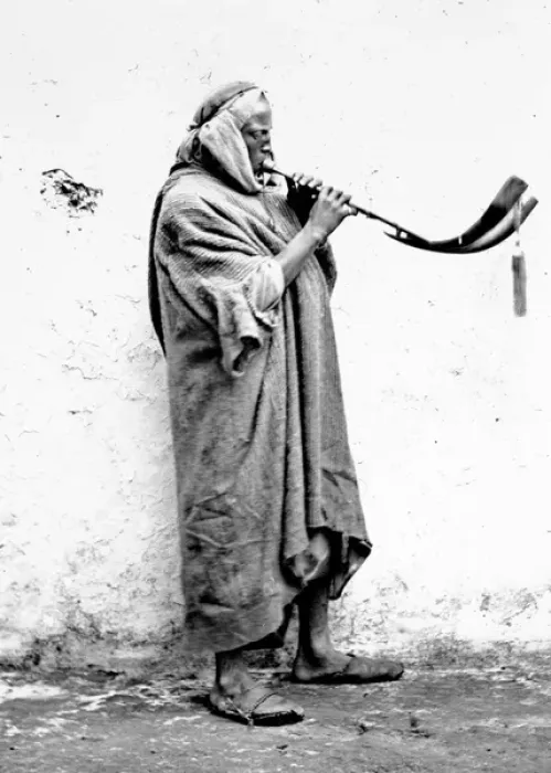 Framed Print : Moorish Musician playing a horn