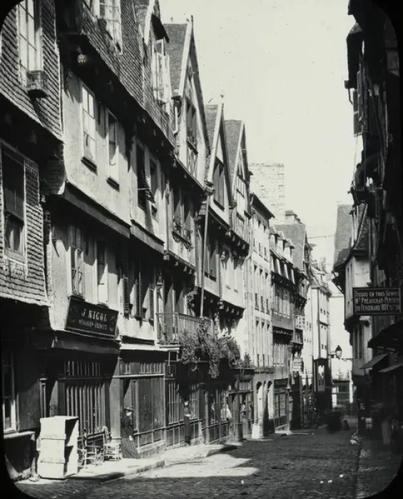 Framed Print : Morlaix - black and white view along street with houses and shops Date: circa 1890s Framed Print : Morlaix - black and white view along street with houses and shops Date: circa 1890s