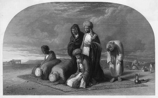 Moslems at Prayer. A group of Moslem men turn towards Mecca and pray, in various attitudes