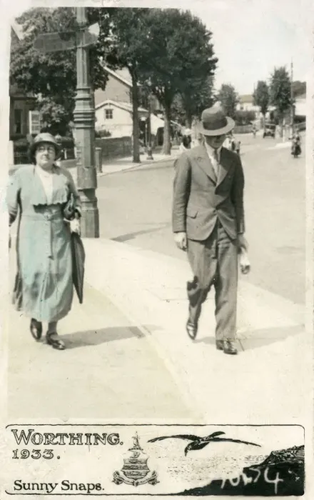 Framed Print : Mother and adult son stroll along a Worthing pavement Framed Print : Mother and adult son stroll along a Worthing pavement