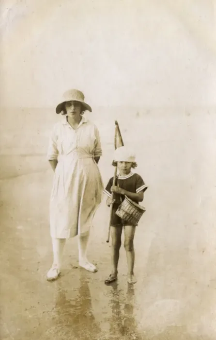 Framed Print : Mother and child standing on the beach - France Framed Print : Mother and child standing on the beach - France