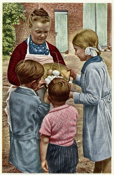 Mother and children with Easter eggs in Brabant, Belgium