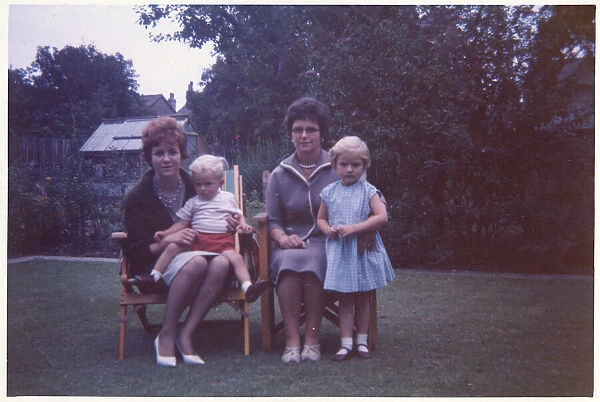 Mother, her daughter and two other young relatives - garden