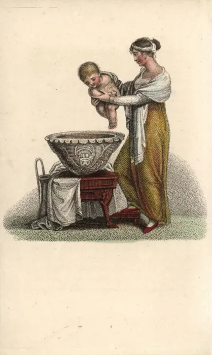 Framed Print : Mother putting her baby into a bath Framed Print : Mother putting her baby into a bath