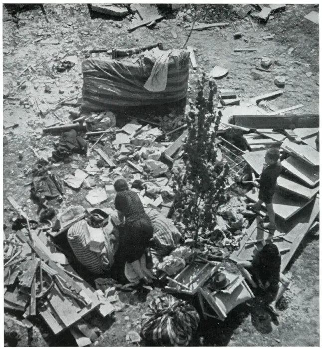 Framed Print : Mother searching for her belongings in debris 1939 Framed Print : Mother searching for her belongings in debris 1939
