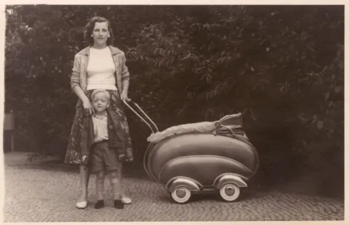 Framed Print : Mother and son with a streamlined Pram Framed Print : Mother and son with a streamlined Pram
