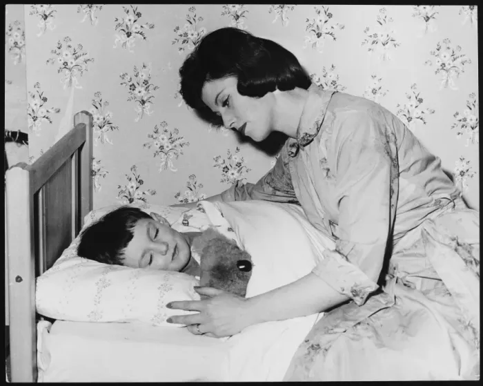 Framed Print : Mother Tucks Son In Framed Print : Mother Tucks Son In