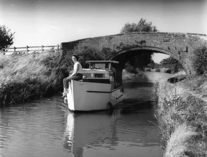 Framed Print : A motor cruiser on a quiet and peaceful stretch of the Oxford Canal, near Claydon Framed Print : A motor cruiser on a quiet and peaceful stretch of the Oxford Canal, near Claydon