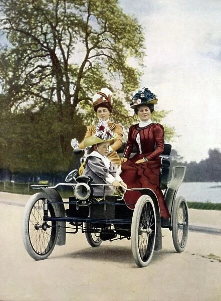 Motoring in the Bois in style in 1900: Vis-a Vis style