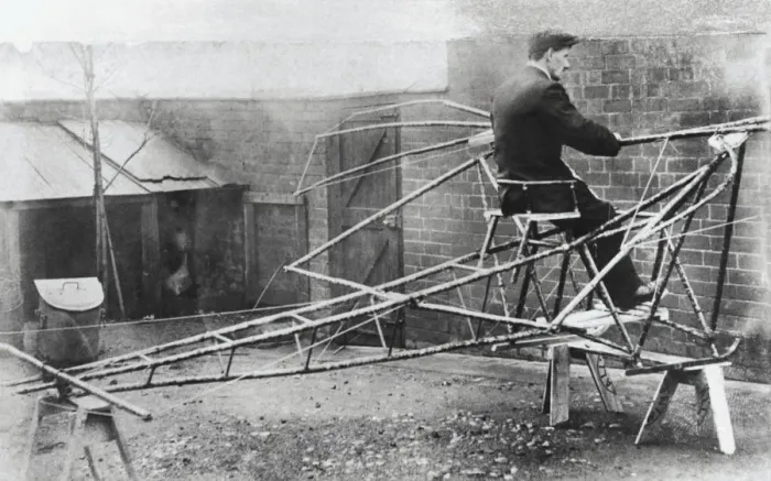 Framed Print : Mr a H Watts Sitting on the Bare Structure of His Man-Po? Framed Print : Mr a H Watts Sitting on the Bare Structure of His Man-Po?