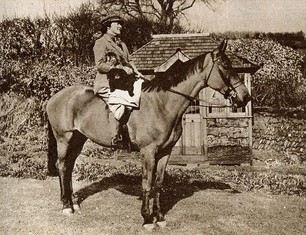 Mrs A. J. Munnings riding a horse in Somerset