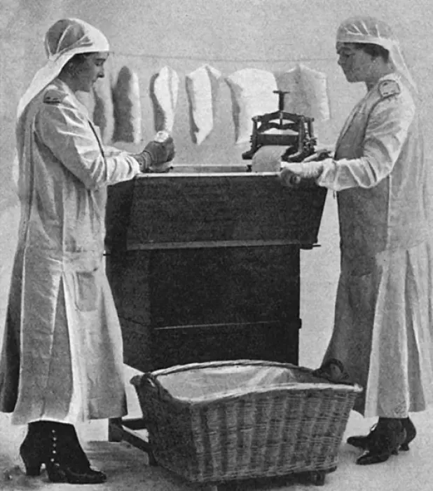 Framed Print : Mrs Lawrence & Mrs Mason carbonising garments for troops, WW1 Framed Print : Mrs Lawrence & Mrs Mason carbonising garments for troops, WW1