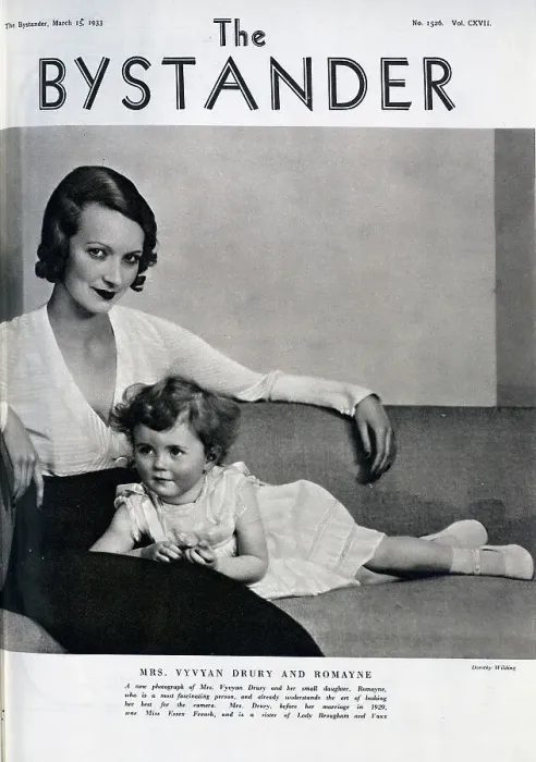 Framed Print : Mrs Vyvyan Drury (1907-1996) and daughter, Romayne, studio portrait seated on couch. With description, A new photograph of Mrs Vyvyan Drury and her small daughter, Romayne, who is a most fascinating person Framed Print : Mrs Vyvyan Drury (1907-1996) and daughter, Romayne, studio portrait seated on couch. With description, A new photograph of Mrs Vyvyan Drury and her small daughter, Romayne, who is a most fascinating person