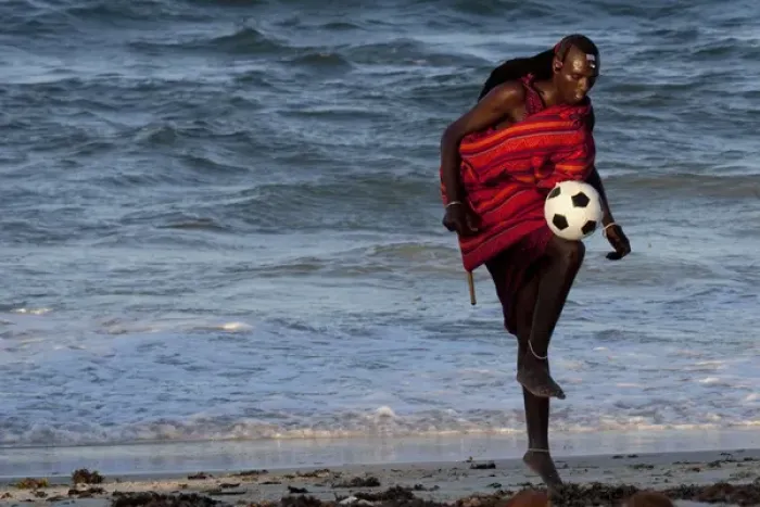 Framed Print : Msai Tribesman - rests playing football after Framed Print : Msai Tribesman - rests playing football after